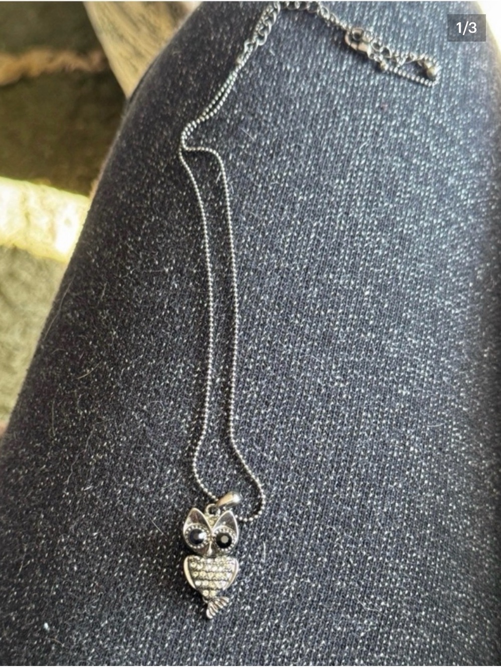 Silver toned owl pendant necklace